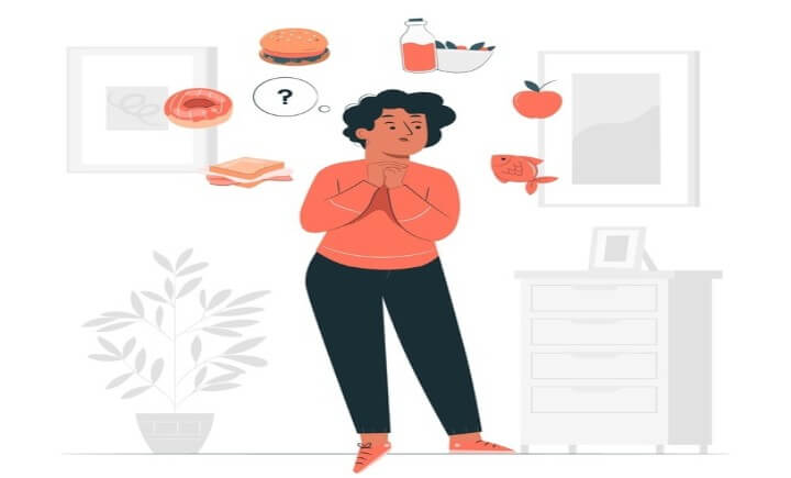 Una mujer está escogiendo entre diferentes alimentos. Imagen que ilustra el tema Cerebro saludable: ¿Cómo influye la alimentación?